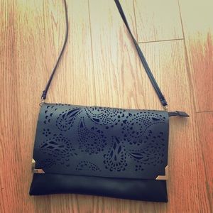 Laser cut shoulder bag black